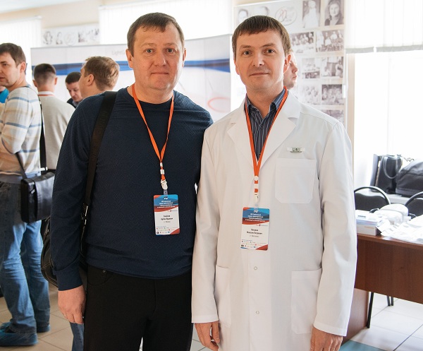 Руководитель клиники "ЦСФ" к.м.н. А.Ю. Семенов с к.м.н. М.П. Потаповым на конференции в Ярославле